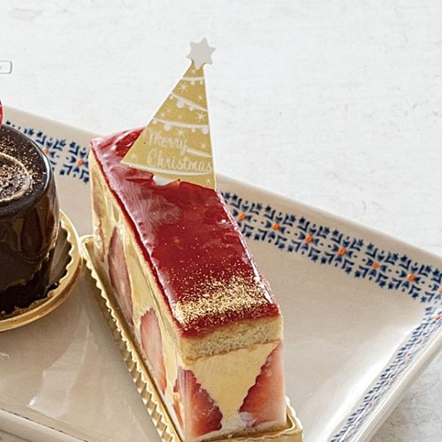 弁当ピック クリスマスケーキピック-ゴ-ルドツリー(100枚) ヘッズ 金色のクリスマスツリー型ピックが並んでいる様子