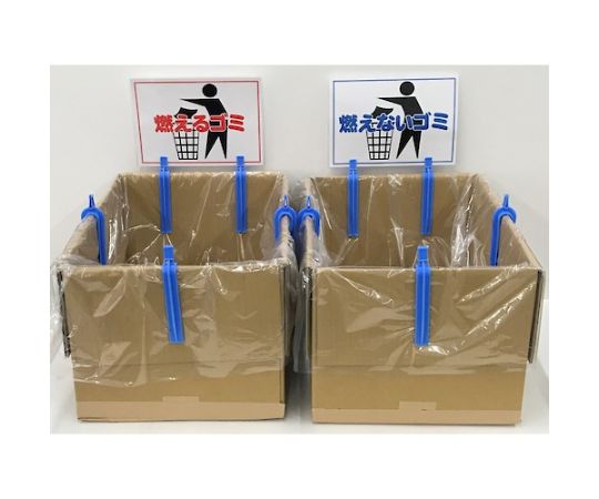 段ボールクリップ　50個入 白い箱に収められた多数のクリップが整然と並んでいる様子