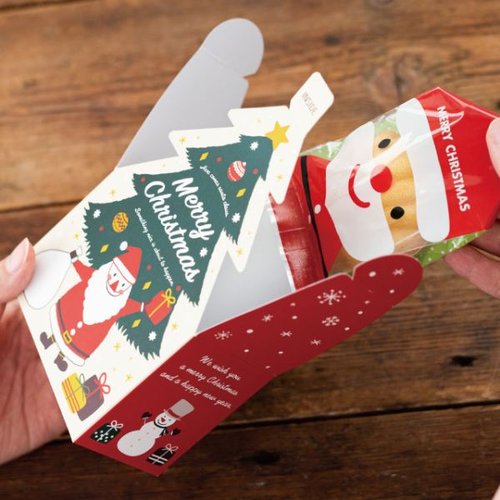 贈答箱 クリスマスミニツリーダイカットボックス-1(20枚) ヘッズ 緑色のダイカットボックスが重ねられた状態と、中央に大きな星型の穴が開いている様子