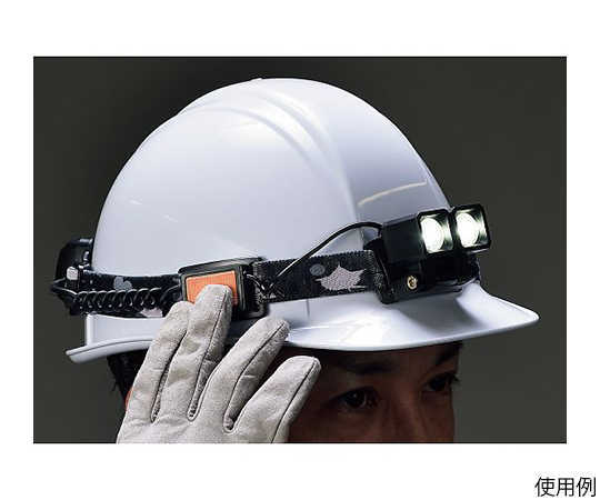 EARTH　MAN 充電式LEDヘッドライト軽量ツイン 充電式ヘッドライトが横向きに配置され、明るいLEDライト部分が目立つ様子