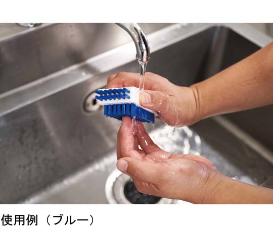 HGツメブラシ Y(イエロー) 角度を変えて撮影されたブラシは、しなやかな毛とイエローの持ち手が特徴的で、先端部分が見える状態。