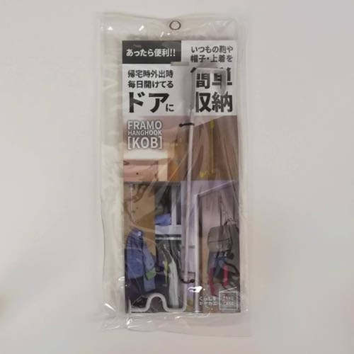 ドアフック ロング フレーモ コブ ハングフック スチール製 ホワイト 白いスチール製のフックがドアに取り付けられ、フック部分が下に向かって長く伸びている状態。