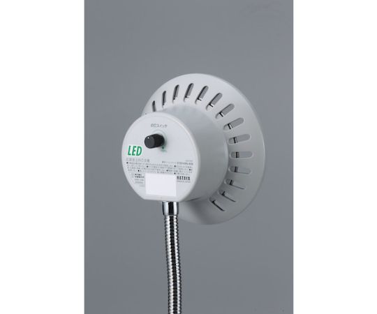 LED投光器 タッチカンライト（クリップ） クリップが付いた状態で横から撮影された照明器具、明るい光を放っている。