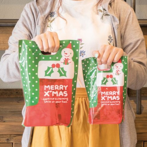 スタンド袋 クリスマススノーマン PPスタンドバッグ-2(50枚) ヘッズ キャラクターが描かれたスタンド袋の正面が見える状態