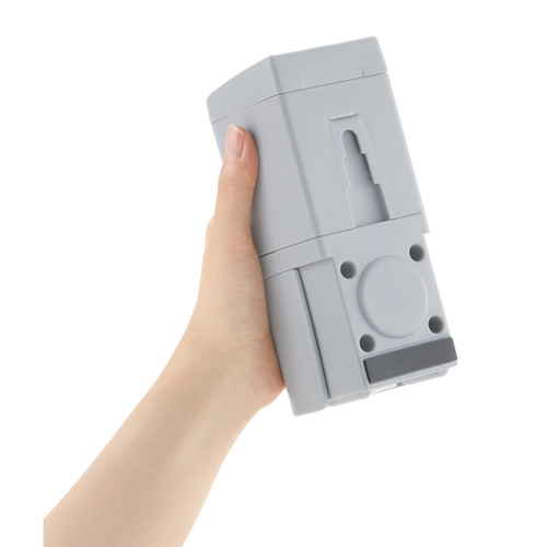 ディスペンサー　シールフック　下から出てくるディスペンサー　250ml　ホバー　グレー シールフックに取り付けられたディスペンサーが下から液体を注ぎ出している様子。