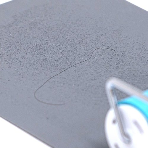 粘着シート Dクイック 5枚入 エクシール 表面にカットラインが入った薄いシートが並ぶ状態