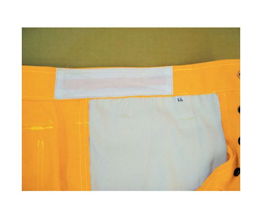 ハイブリッド（耐熱・耐切創）作業服　ズボン　ネイビーブルー 横からの視点で、膝部分に強化素材が施された作業服のズボン