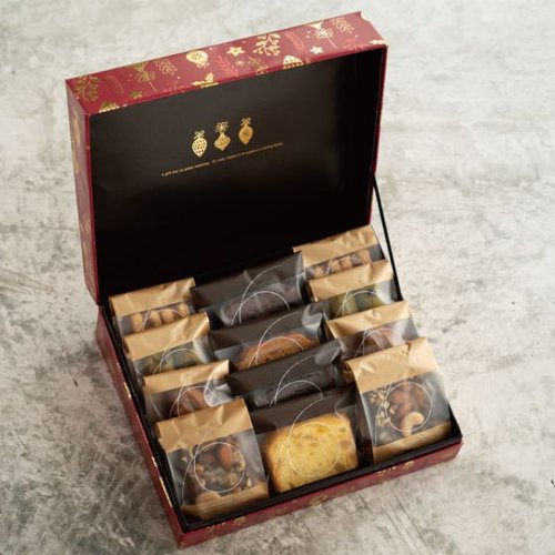 贈答箱 クリスマスオーナメント デザイン貼箱-M(4個) ヘッズ カラフルなクリスマスデザインの箱が整然と並んでいる様子