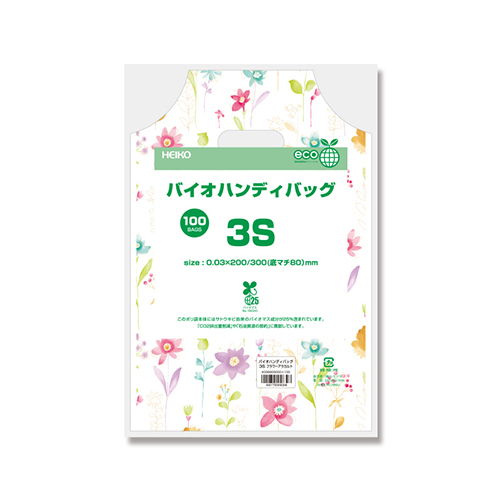 HEIKO 手抜き (小判抜き)ポリ袋 バイオハンディバッグ 3S フラワーアラカルト 100枚 花柄プリントが表面に並んだ小判型の持ち手穴付き薄手ポリ袋が多数折りたたまれて重ねられた様子
