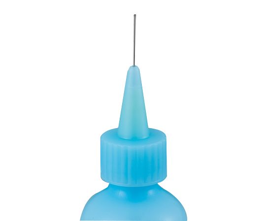 シリンジオイラー　60mL 透明な容器に入った細長い道具が正面を向いている状態