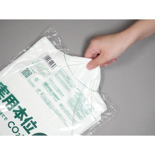 LDゴミ袋 実用本位 nocoo in(ノクーイン) 70L 白半透明 10枚 0.03mm 日本サニパック パッケージが斜めに置かれ、中身の薄い白色が透けて見える状態