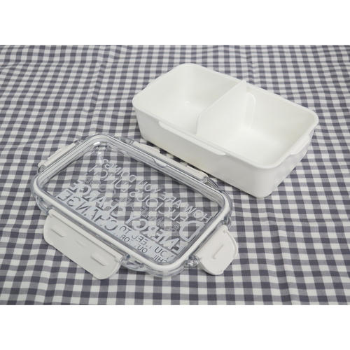 弁当箱　ランチボックス　ホワイト　エナジーチャージ　650ml 白い容器に蓋が少し開いた状態で、内側の仕切りが見える。