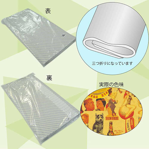 包装紙 半才 キスミー ロールが横向きに置かれ、片端の紙芯が見えて表面にカラフルな柄が並んでいる状態