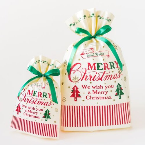 ポリ手提げ クラシカルクリスマス リボン付PEギフトバッグ-M(20枚) ヘッズ リボンが付いたクリスマスデザインの手提げ袋が重なっている様子