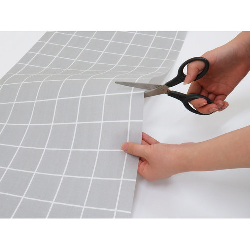 防虫シート　MSS　キッチンボードに敷くシート　35×360cm　グレー シートが折りたたまれた状態で、グレーの色合いが見える様子