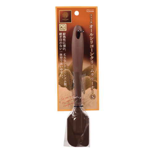 ヘラ　23.5cm　S　ラフィネ　シリコーン 先端が広がった柔らかいシリコーン素材のヘラが平らに置かれている様子