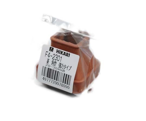 フリーサイズゴム脚キャップ(バラ) 角 20～30ミリ用 茶 ブラウンのゴム脚キャップが横向きに並んでいる状態で、細やかなテクスチャーと形状がはっきりと見える。