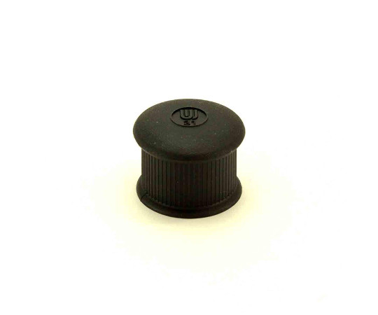 イスキャップ　丸脚用　黒　対象脚サイズ31mm 黒い丸脚用キャップが平らな面に置かれ、周囲は明るい背景で囲まれている様子。