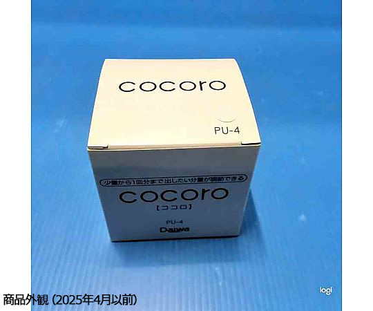 液体調味料入れ COCORO（ココロ）ホワイト 透明なボトルに液体が入った状態で、逆さに置かれている様子