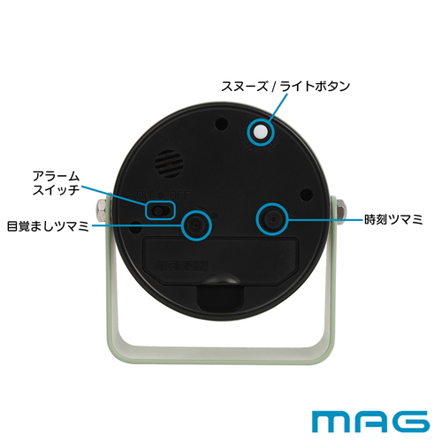 置き時計　電子音目覚まし時計　モナカ　グリーン 緑色のボディに白い文字盤が特徴の時計が横向きに置かれている様子