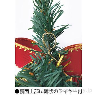 ウォールデコレーションツリー 緑色の葉と茶色の幹で装飾された精巧なデザインのツリーが壁に取り付けられた様子